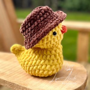 the finished crochet duck using the free crochety rubber duck pattern by LisaAuch crochet