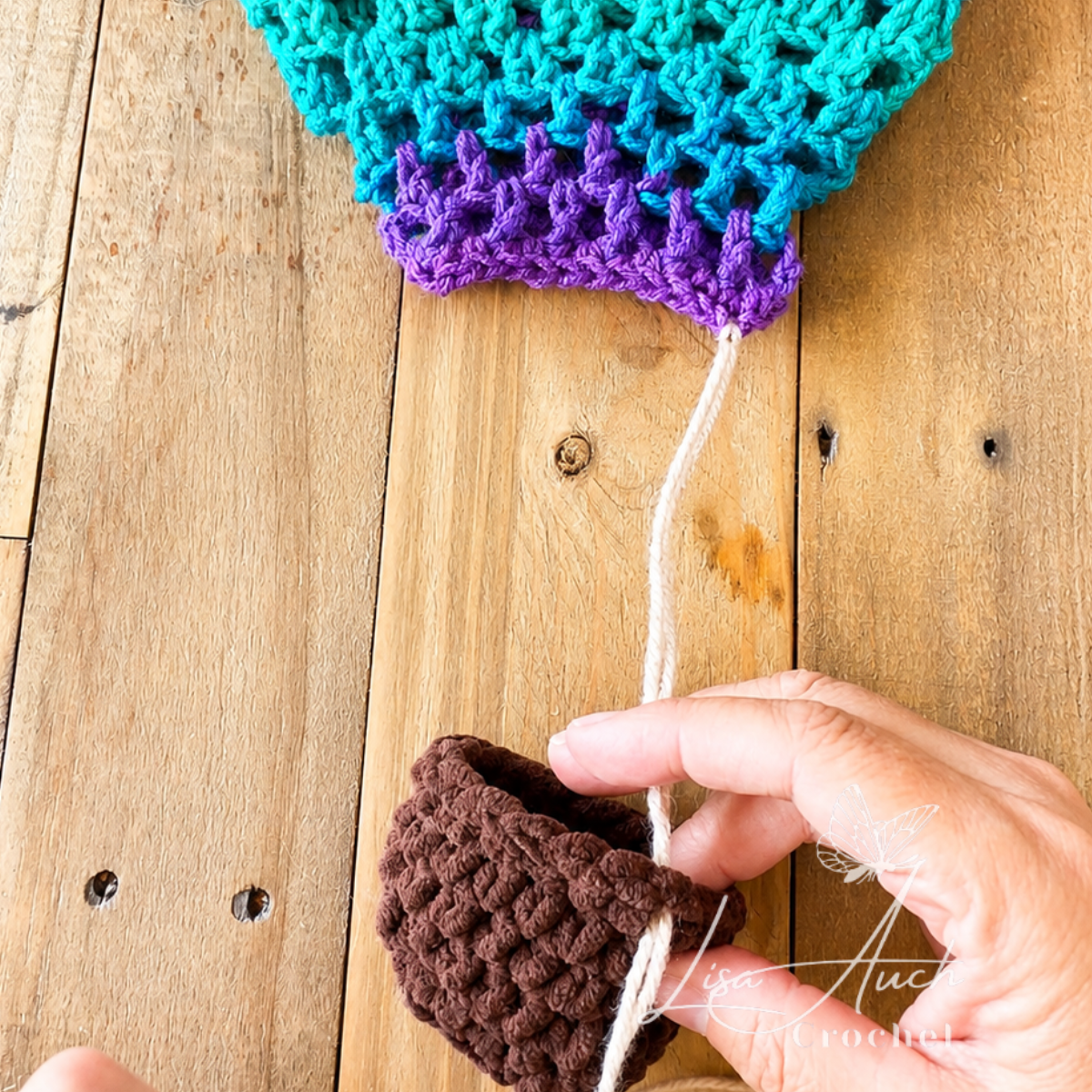 Adding the ties to the croche thot air balloon
